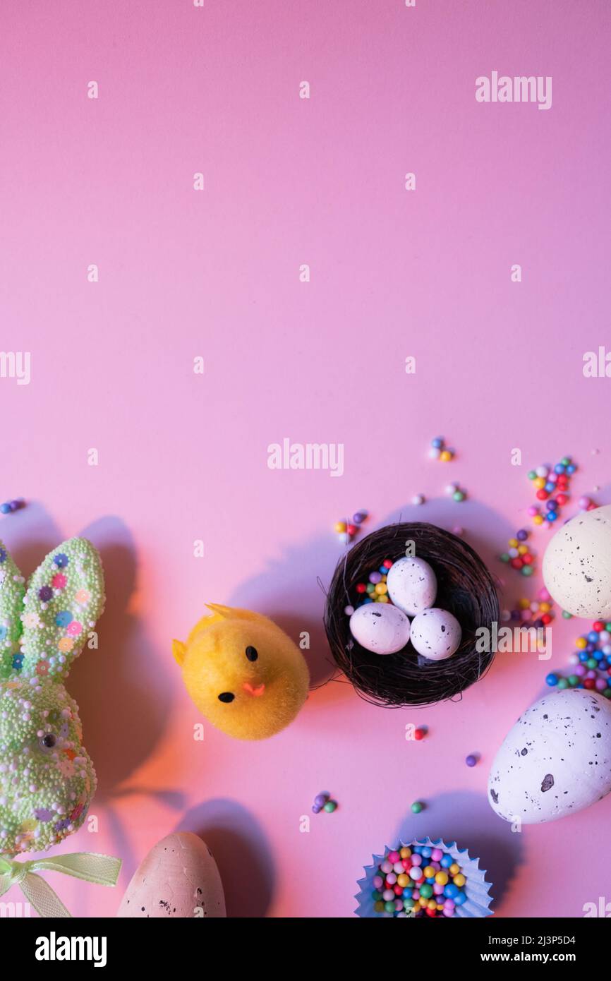 background easter colorful violet with eggs,chick and rabbit Stock Photo