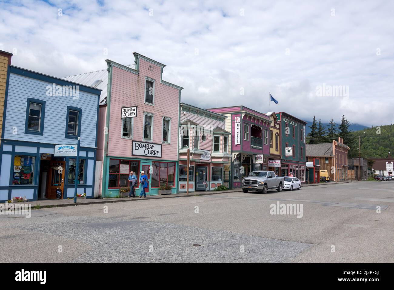 Historic Buildings On 5th Ave Skagway  Mostly Shops And Restaurants Including Bombay Curry, Radio Shack. Skagway Alaska A Popular Cruise Ship Stop In Stock Photo