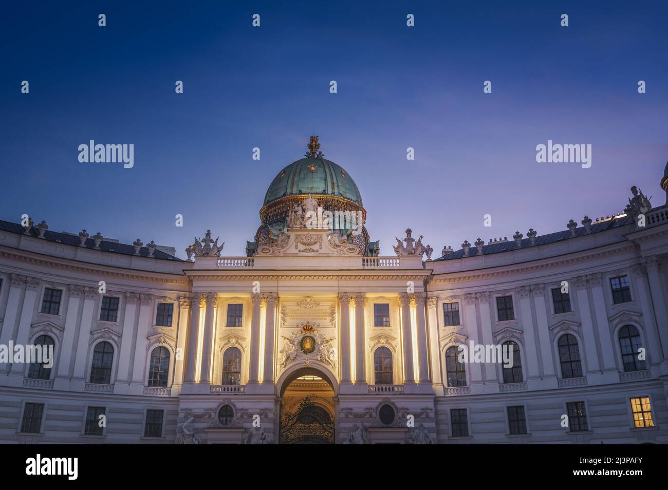 St Michaels Wing of Hofburg Palace at night - Vienna, Austria Stock Photo