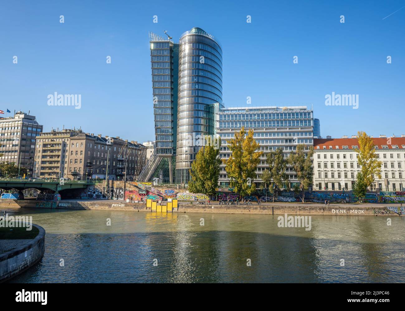 UNIQA Tower at Donaukanal (Danube Canal) - Vienna, Austria Stock Photo