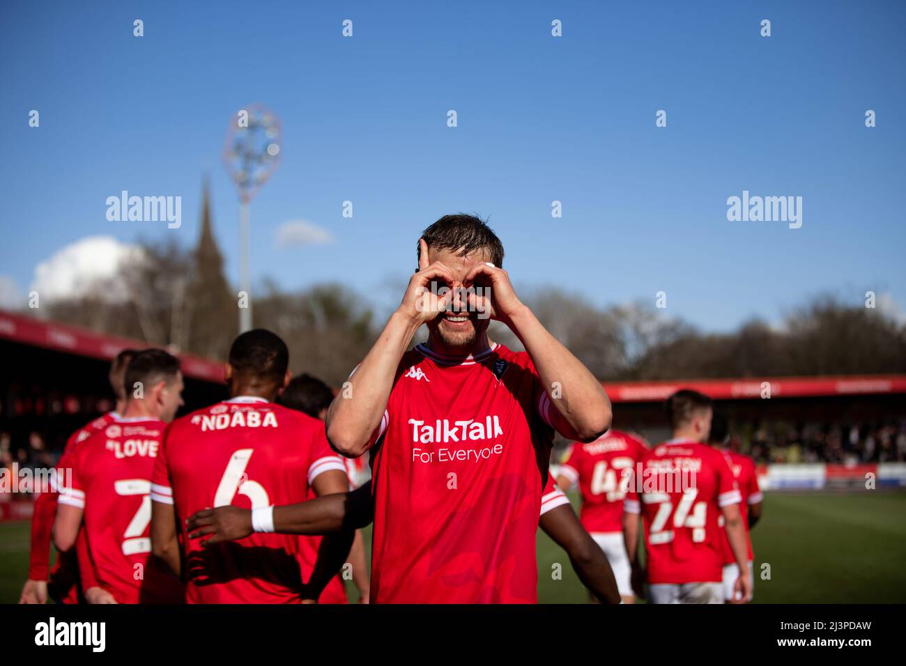 Salford striker Matt Smith celebrates after scoring to take the lead as Salford City beat Harrogate Town 2-0. Salford, UK. 9th April 2022. Stock Photo