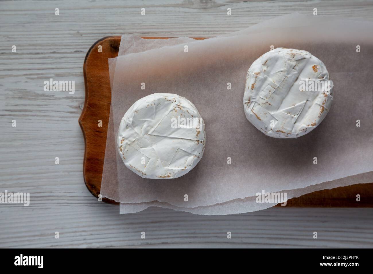 Alpine Blue Cheese on a rustic wooden board, top view. Flat lay