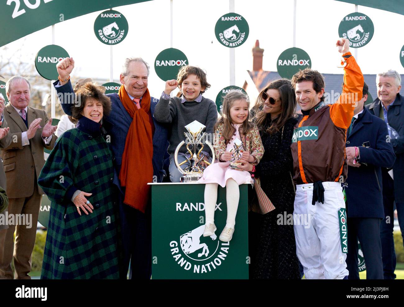 Jockey Sam Waley-Cohen celebrates with his wife Bella, their children and his parents Robert and Felicity Waley-Cohen after winning the Randox Grand National Handicap Chase on Noble Yeats during Grand National Day of the Randox Health Grand National Festival 2022 at Aintree Racecourse, Liverpool. Picture date: Saturday April 9, 2022. Stock Photo