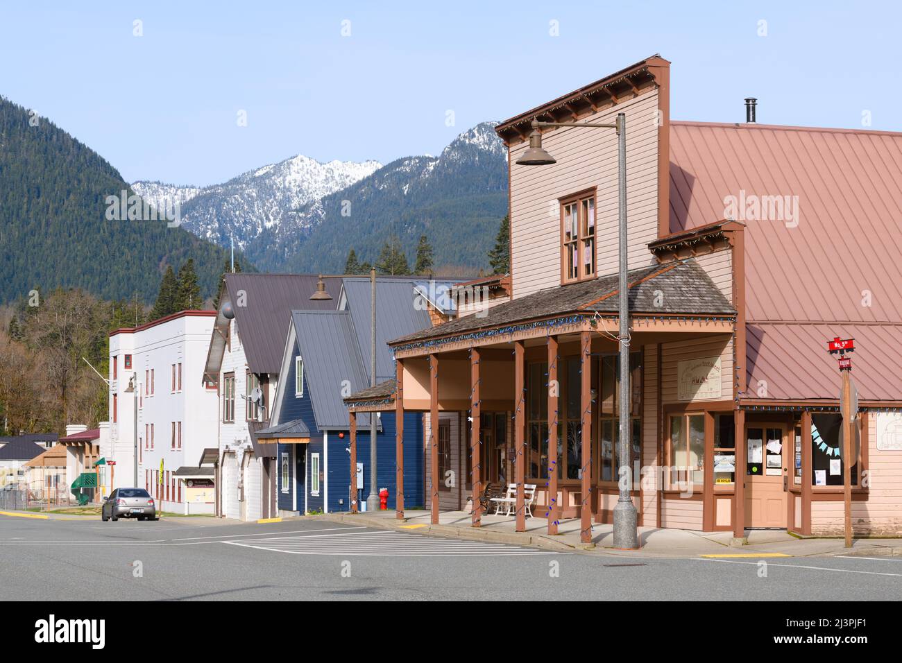 Skykomish, WA, USA - April 07, 2022; View west along Railroad Avenue in the Cascade Mountain town of Skykomish, a former Great Northern railway town Stock Photo