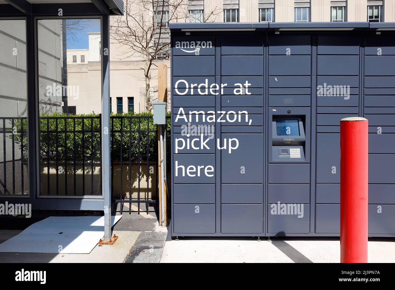 An automated, self-service Amazon Hub Locker. The amazon lockers store deliveries that are picked up by customers at their convenience. Stock Photo