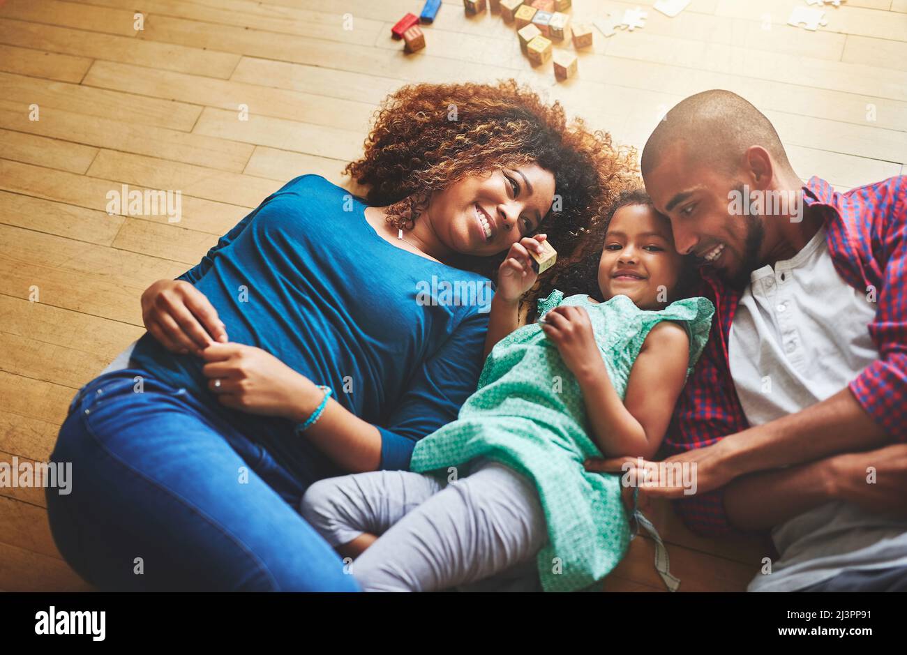 She can make any moment special. Cropped shot of a family of three spending quality time together. Stock Photo