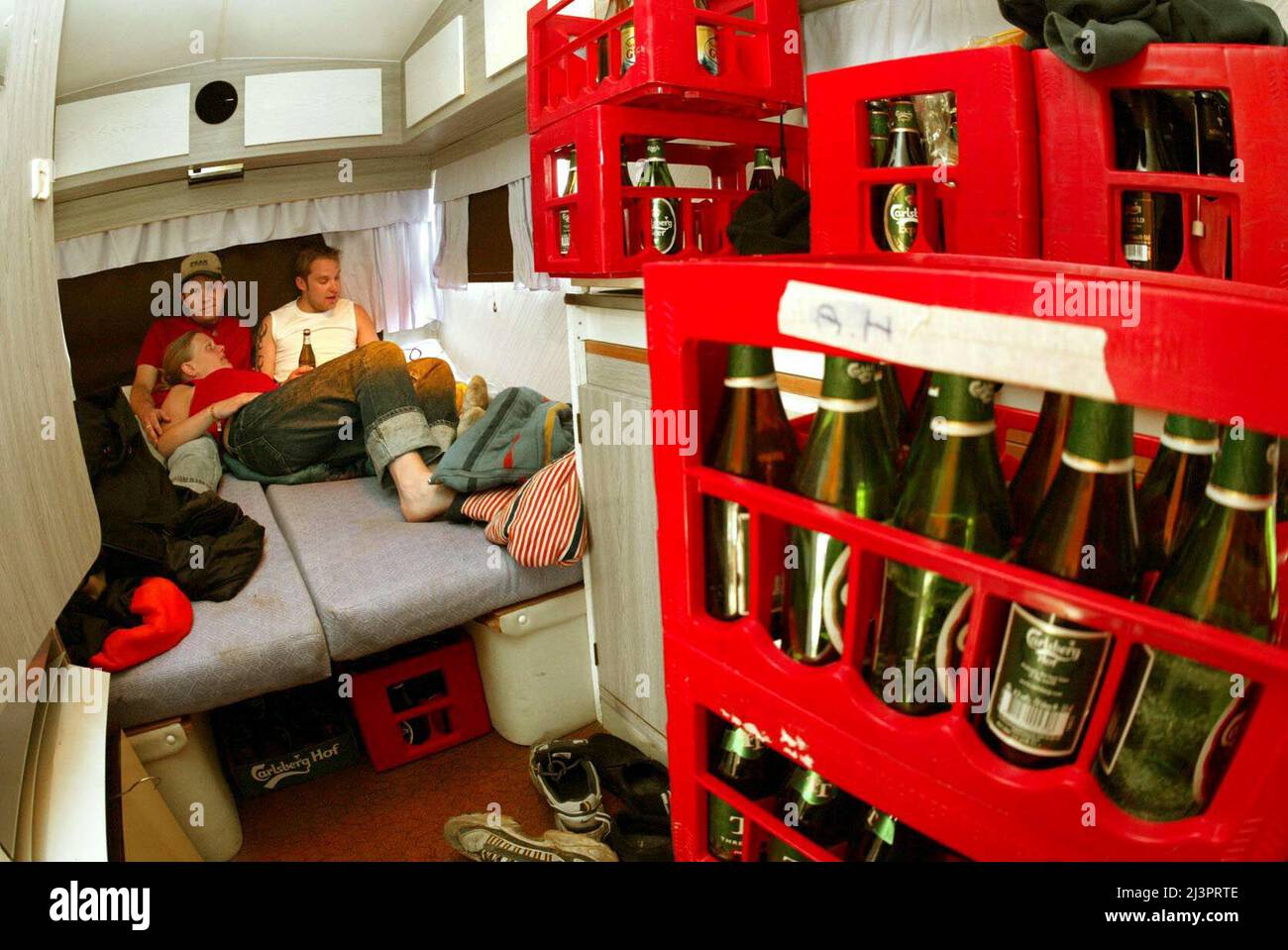 sommer så meget svimmelhed Calle and David Hjelm (brothers) and Maria Westerling living in a caravan  during the Hultsfred festival, Hultsfred, Sweden Stock Photo - Alamy