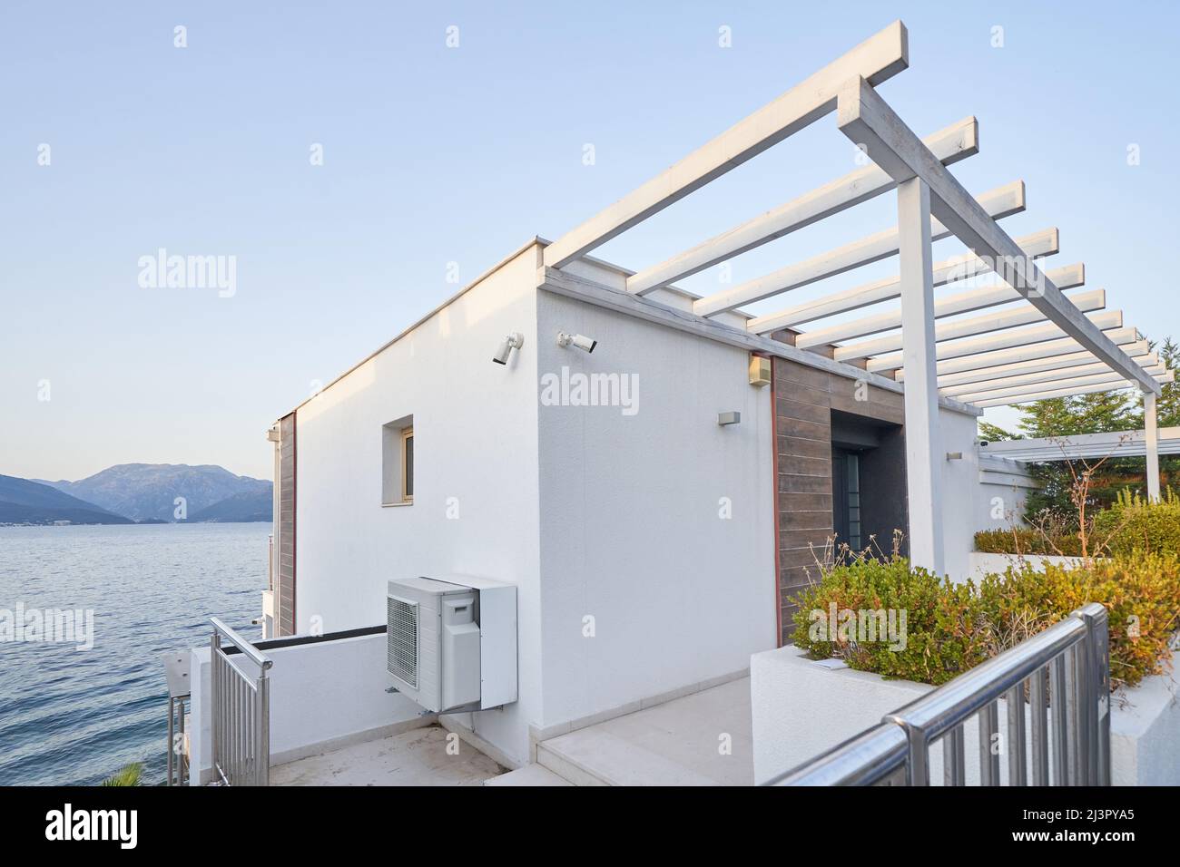 Modern house with sea and mountain views Stock Photo