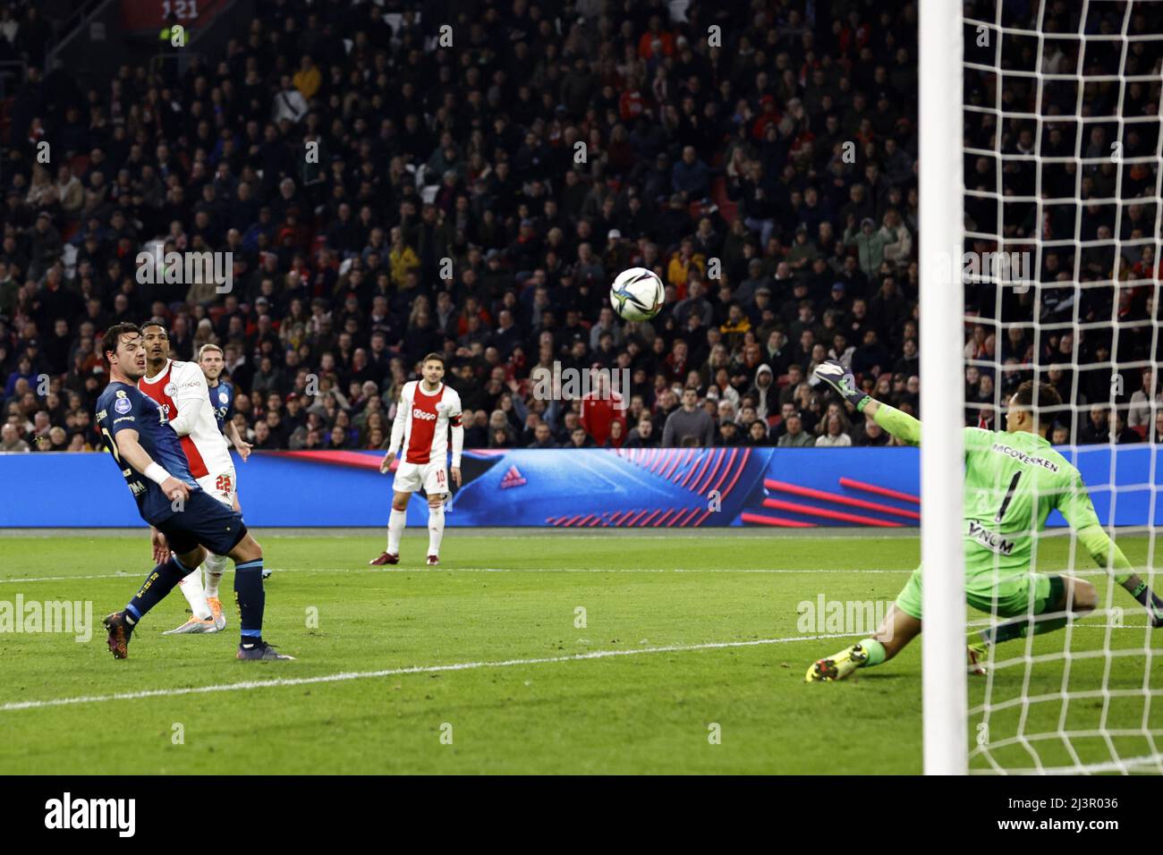 AMSTERDAM - (lr) Dirk Abels of Sparta Rotterdam, Sebastien Haller of Ajax scores but the goal is disallowed during the Dutch Eredivisie match between Ajax and Sparta Rotterdam at the Johan Cruijff ArenA on April 9, 2022 in Amsterdam, Netherlands. ANP MAURICE VAN STEEN Stock Photo