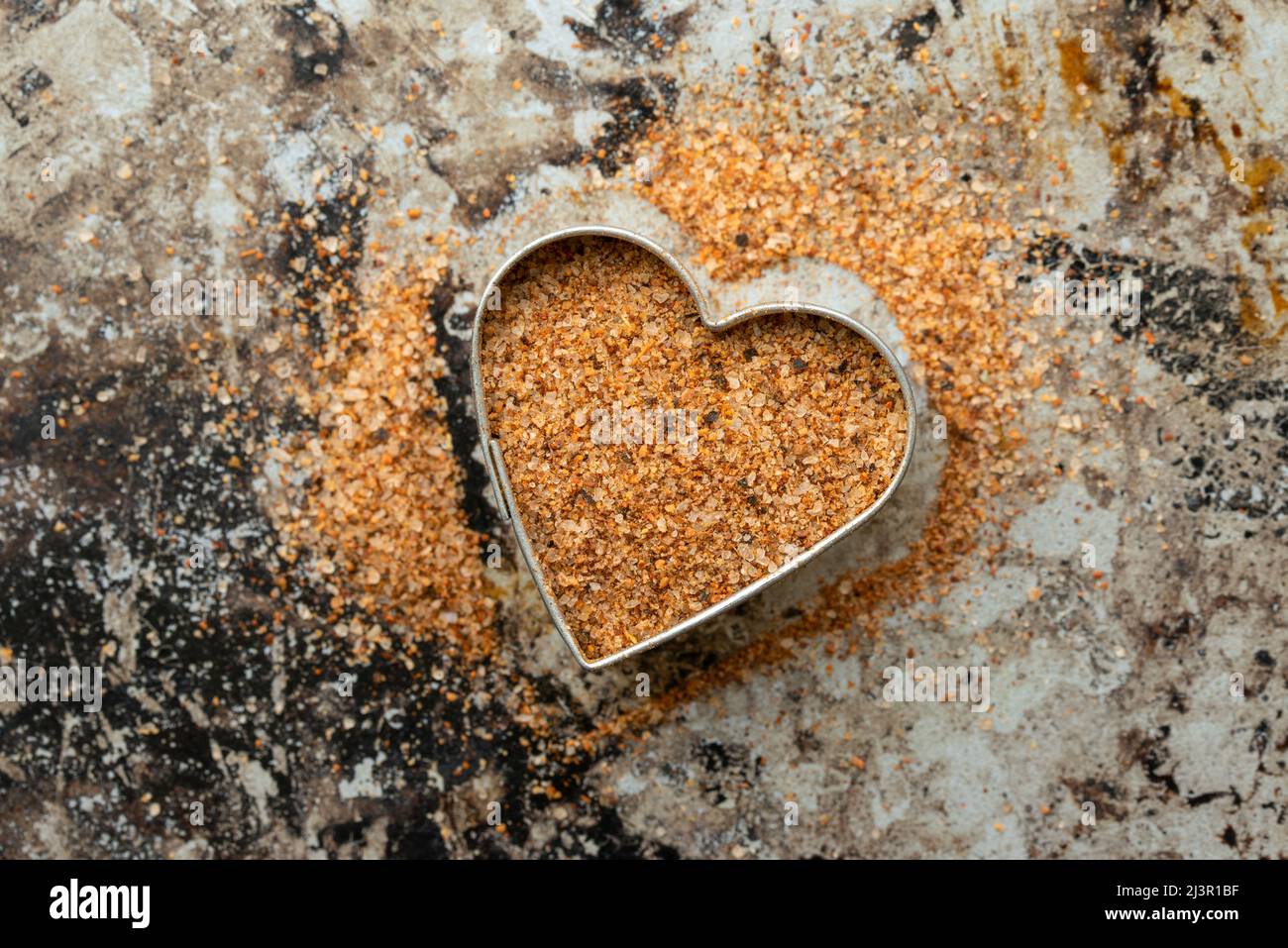 Cajun Seasoning in a Heart Shape Stock Photo