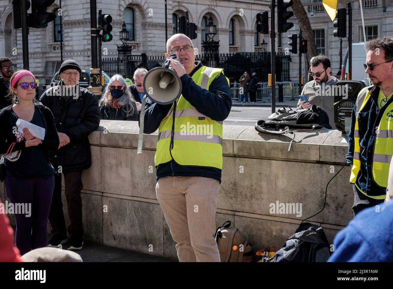 London, UK 9th April 2022. UK trade unions rally in solidarity with Ukraine. PCS union assistant general secretary, John Moloney addresses the rally in Whitehall. Stock Photo