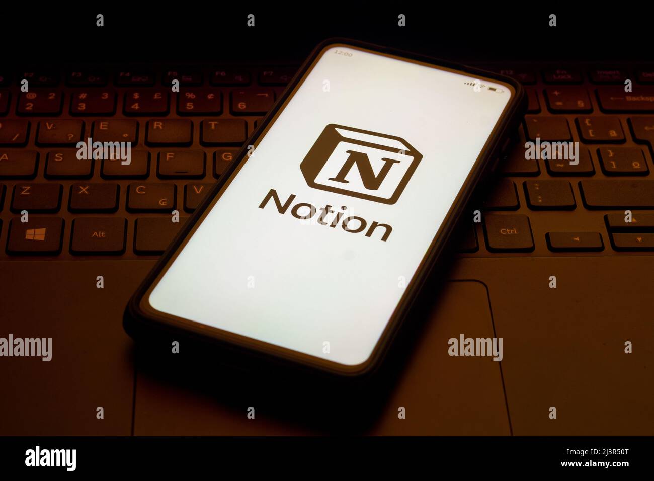 In this photo illustration the Notion logo seen displayed on a smartphone. Stock Photo