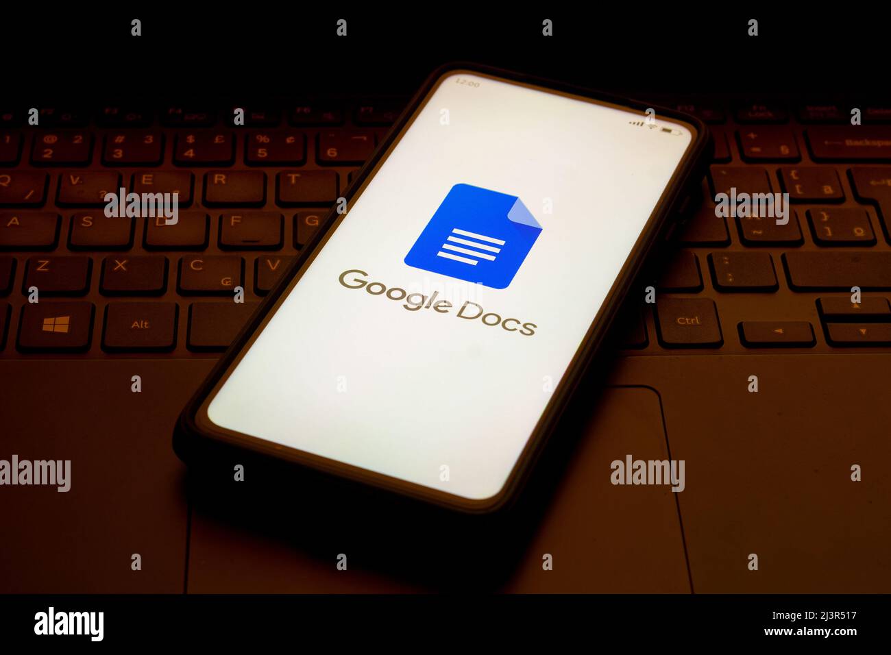 In this photo illustration the Google Docs logo seen displayed on a smartphone. Stock Photo