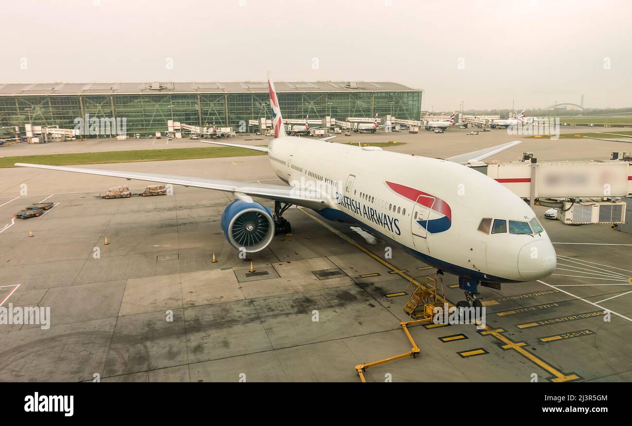 British Airways plane slot dock Terminal 5 Heathrow Airport London England UK Stock Photo