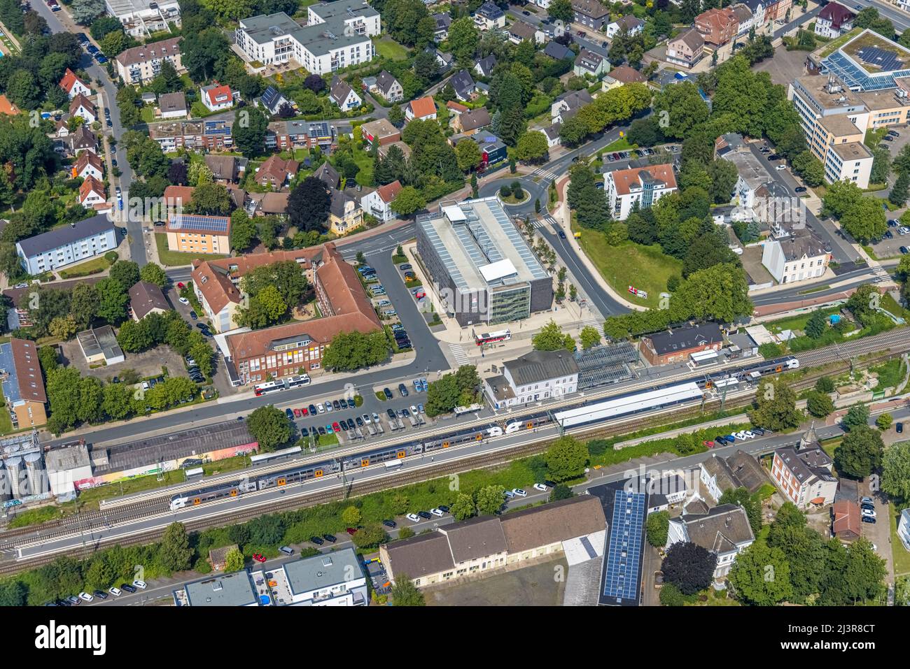 Aerial view, Kamen railway station with multi-storey car park and building of the Unna district police authority Kamen police station, Kamen, Ruhr are Stock Photo