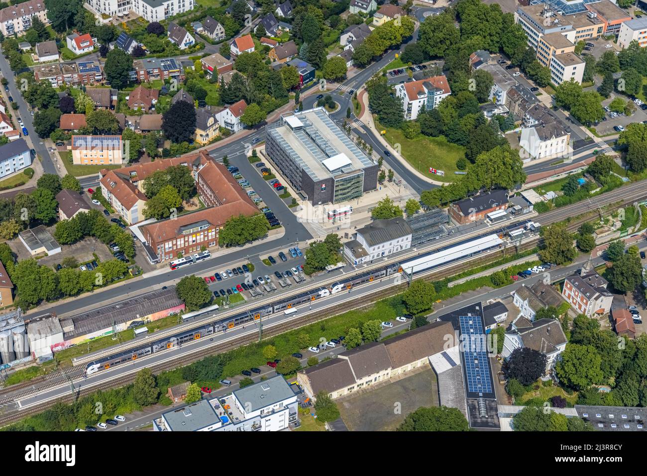 Aerial view, Kamen railway station with multi-storey car park and building of the Unna district police authority Kamen police station, Kamen, Ruhr are Stock Photo