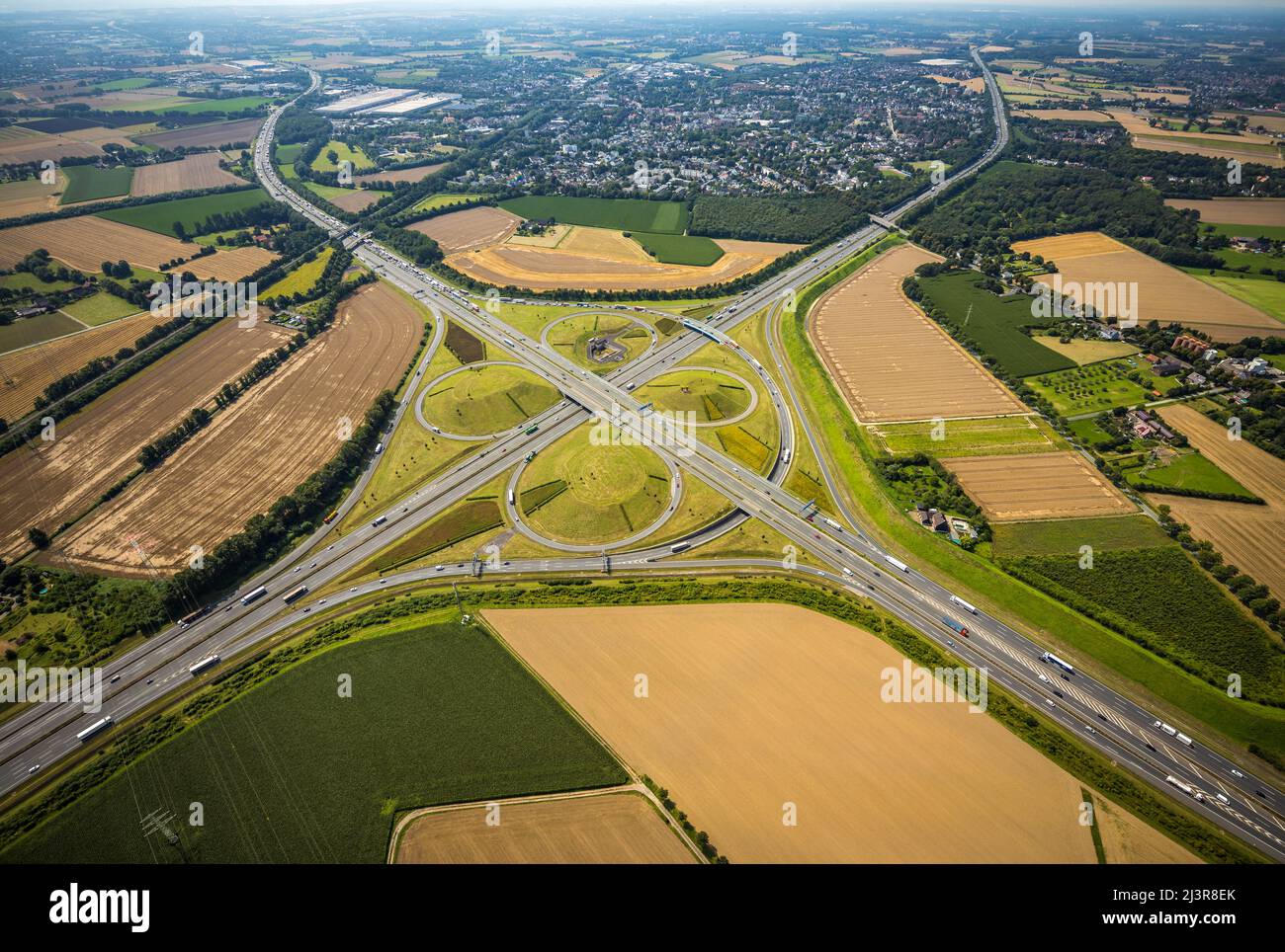 Aerial view, Kamener Kreuz with motorway A1 and motorway A2, helicopter sculpture Yellow Angel in inner circle, Kamen, Ruhr area, North Rhine-Westphal Stock Photo