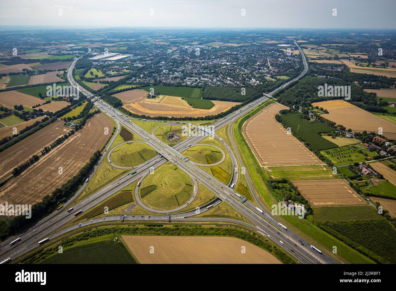 Aerial view, Kamener Kreuz with motorway A1 and motorway A2, helicopter sculpture Yellow Angel in inner circle, Kamen, Ruhr area, North Rhine-Westphal Stock Photo