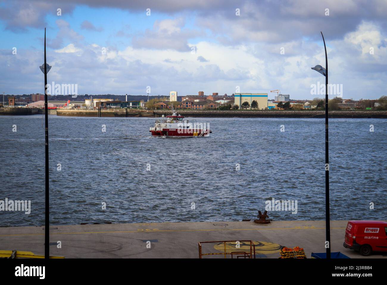 Little boat on the River Mersey Stock Photo