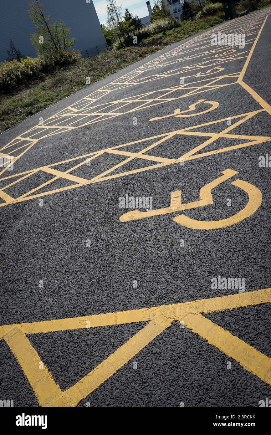 Empty disabled parking spaces, blue badge parking space Stock Photo