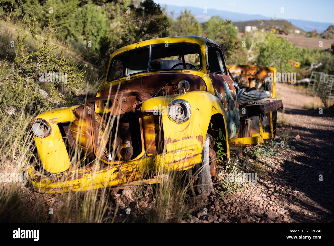 Abandoned old car in the desert Stock Photo - Alamy
