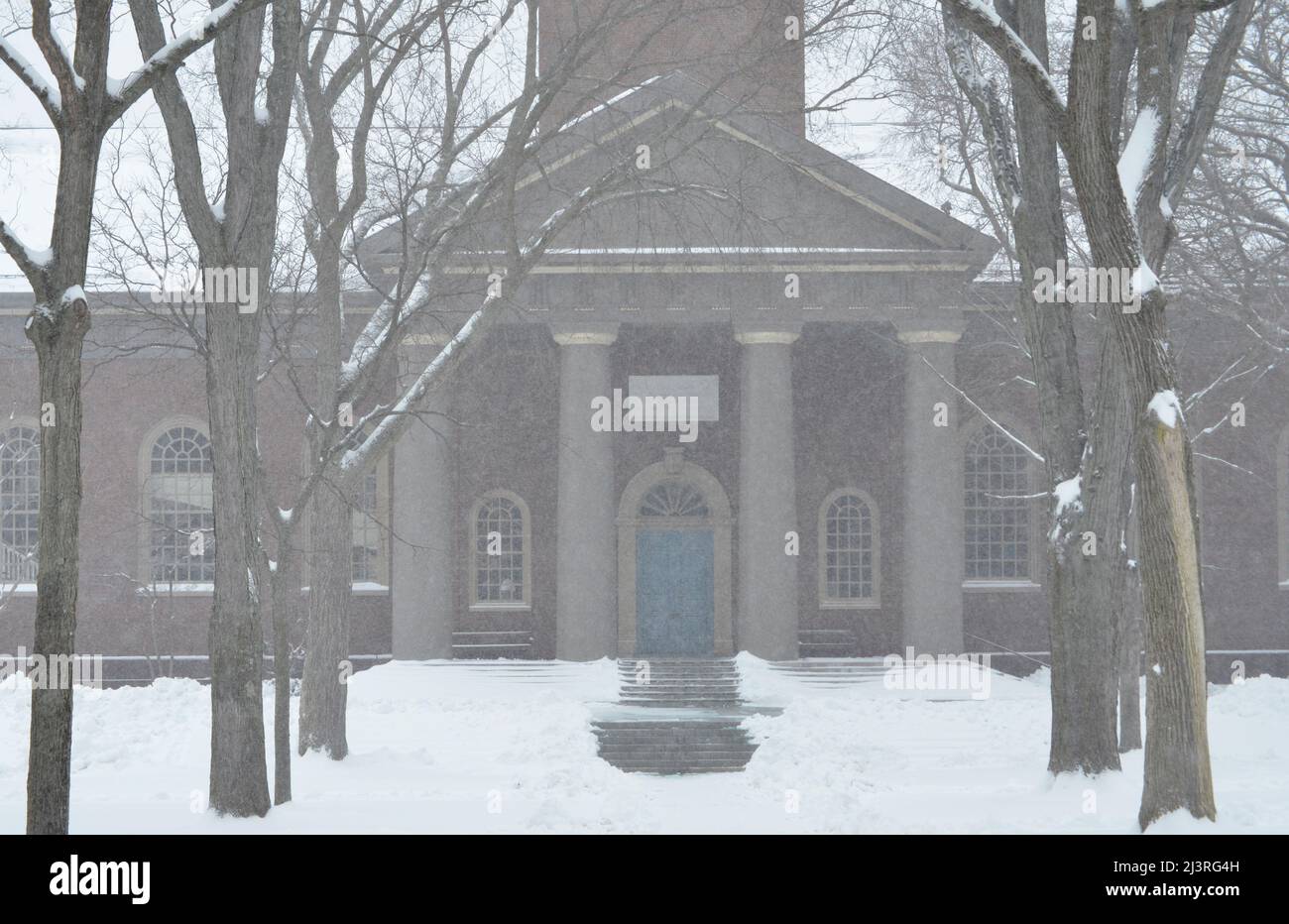 Snowy winter scene from the Harvard University campus in Cambridge ...