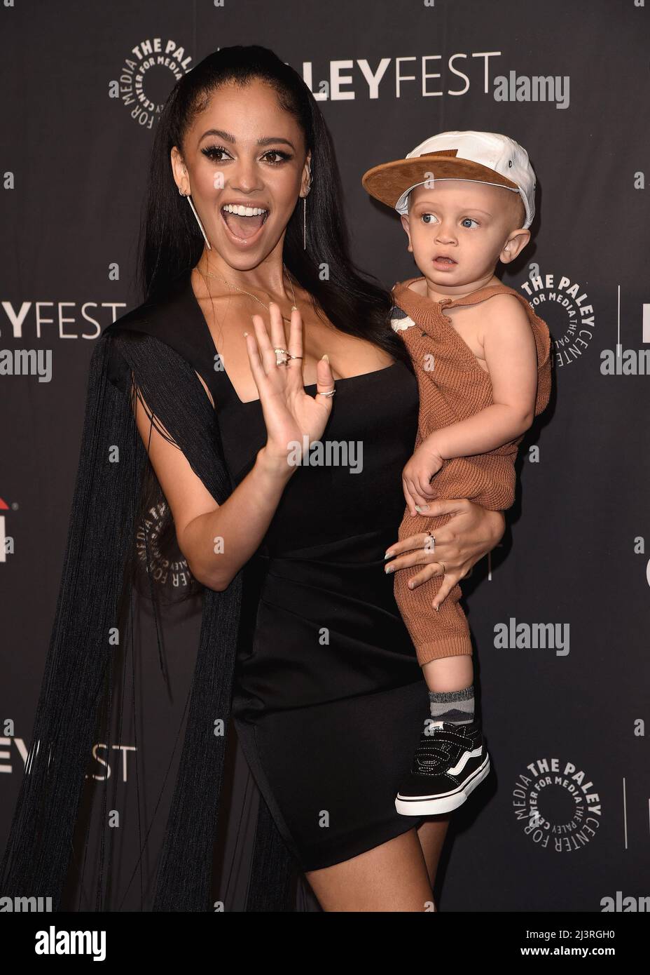 Vanessa Morgan Vanessa Morgan walking on the red carpet at PaleyFest LA 2022