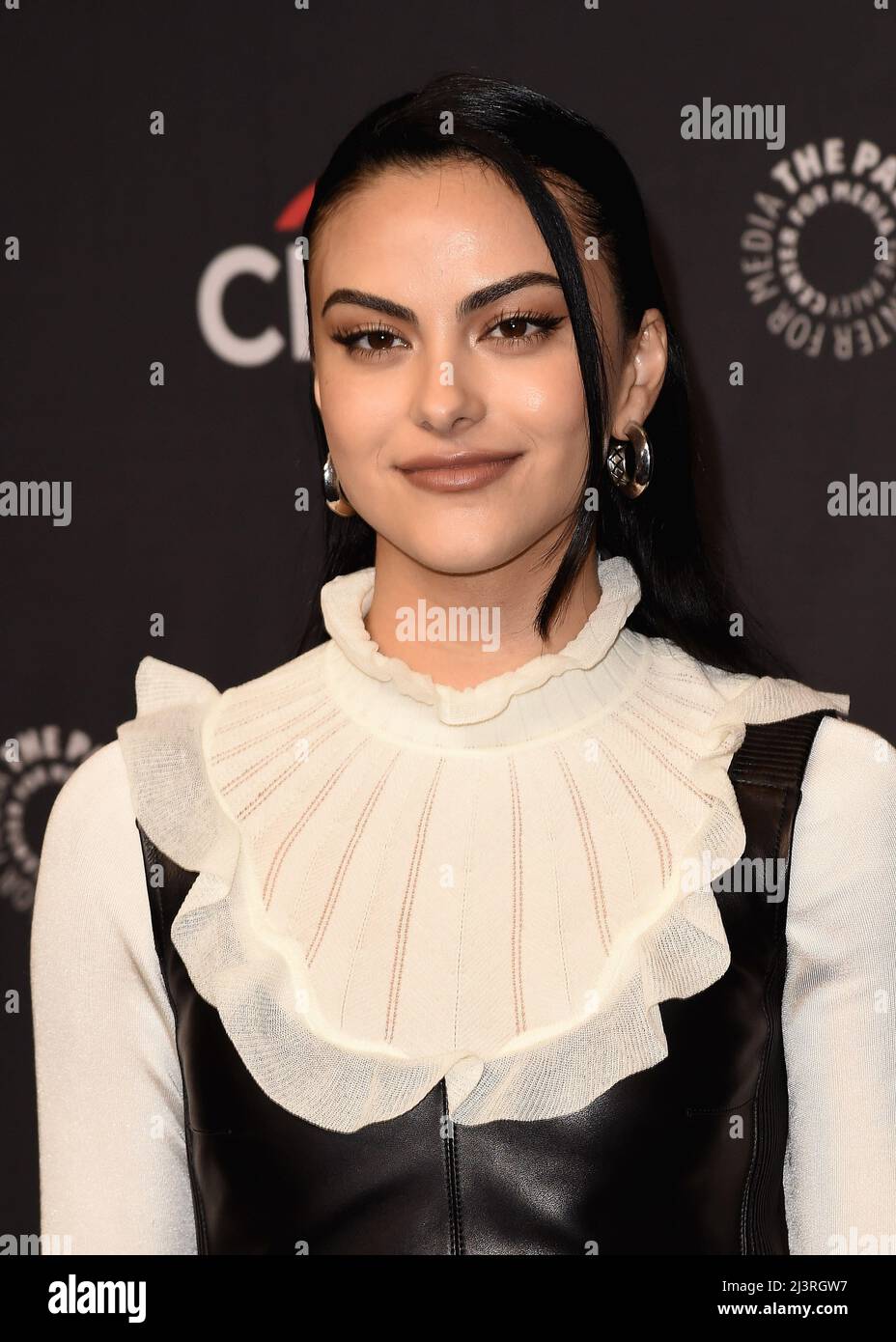 Camila Mendes walking on the red carpet at PaleyFest LA 2022