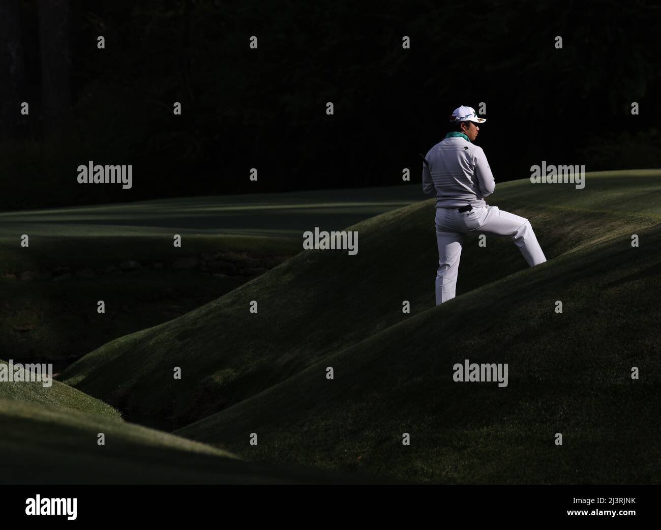 Augusta, United States. 09th Apr, 2022. Hideki Matsuyama of Japan stands on the 13th green near Raes Creek in the third round of The Masters golf tournament at Augusta National Golf Club in Augusta, Georgia on Saturday, April 9, 2022. Photo by John Angelillo/UPI Credit: UPI/Alamy Live News Stock Photo