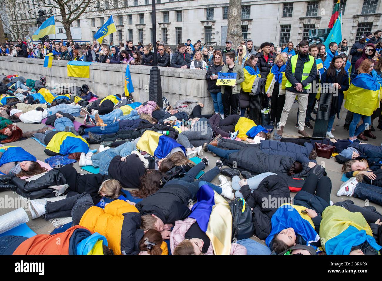 LONDON, APRIL 09 2022, Ukrainian protesters demonstrate against the Russian invasion of Ukraine outside Downing Street on Whitehall, London. Stock Photo