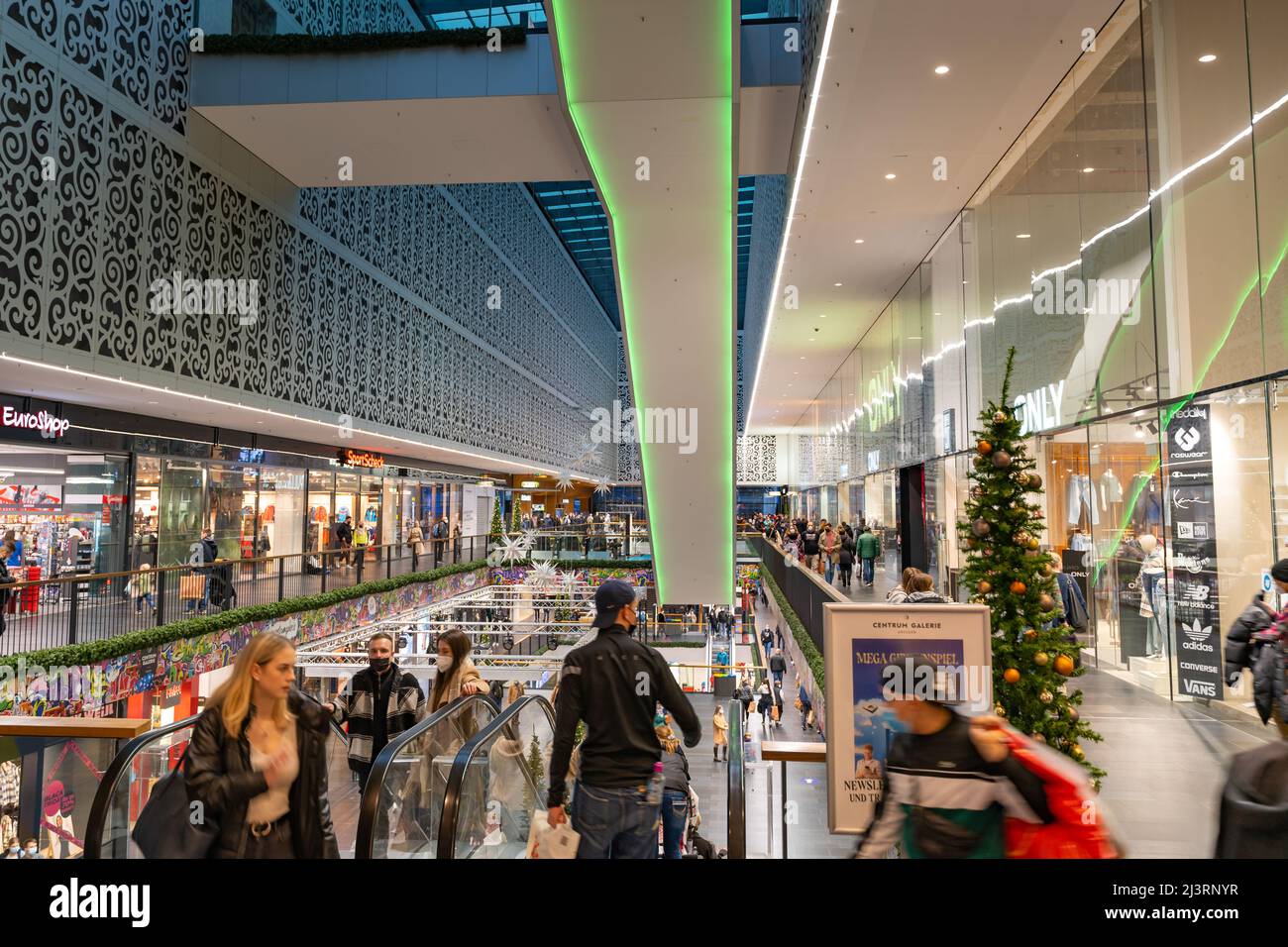 Crowded Centrum Galerie shopping mall with a lot of people. The interior is  decorated for the Christmas time. Retail shops increasing sales Stock Photo  - Alamy