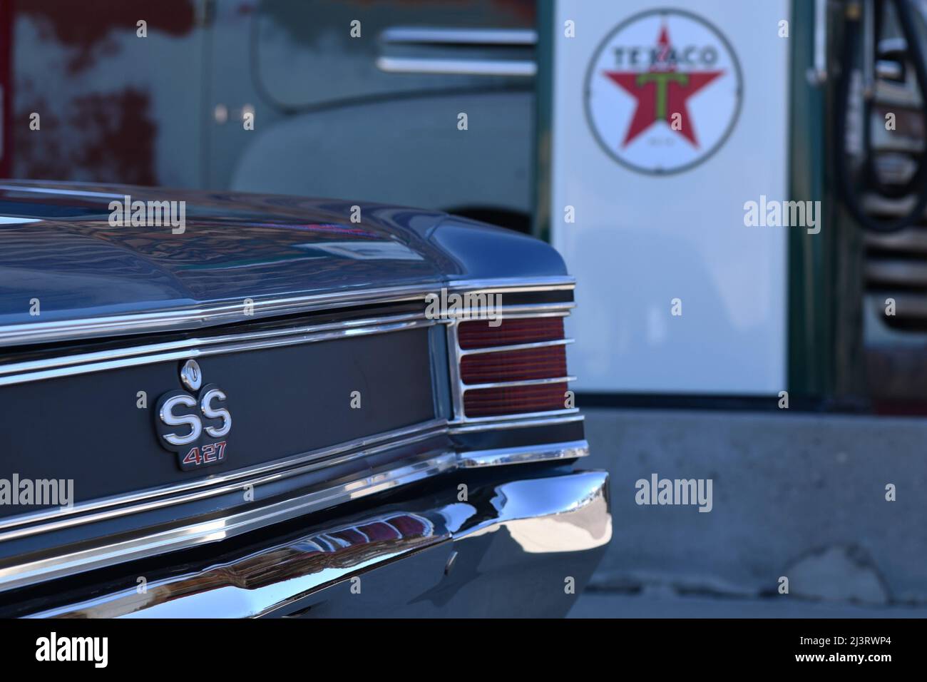 1967 Chevrolet Chevelle SS 427 perspective view at a vintage Texaco gas station Stock Photo