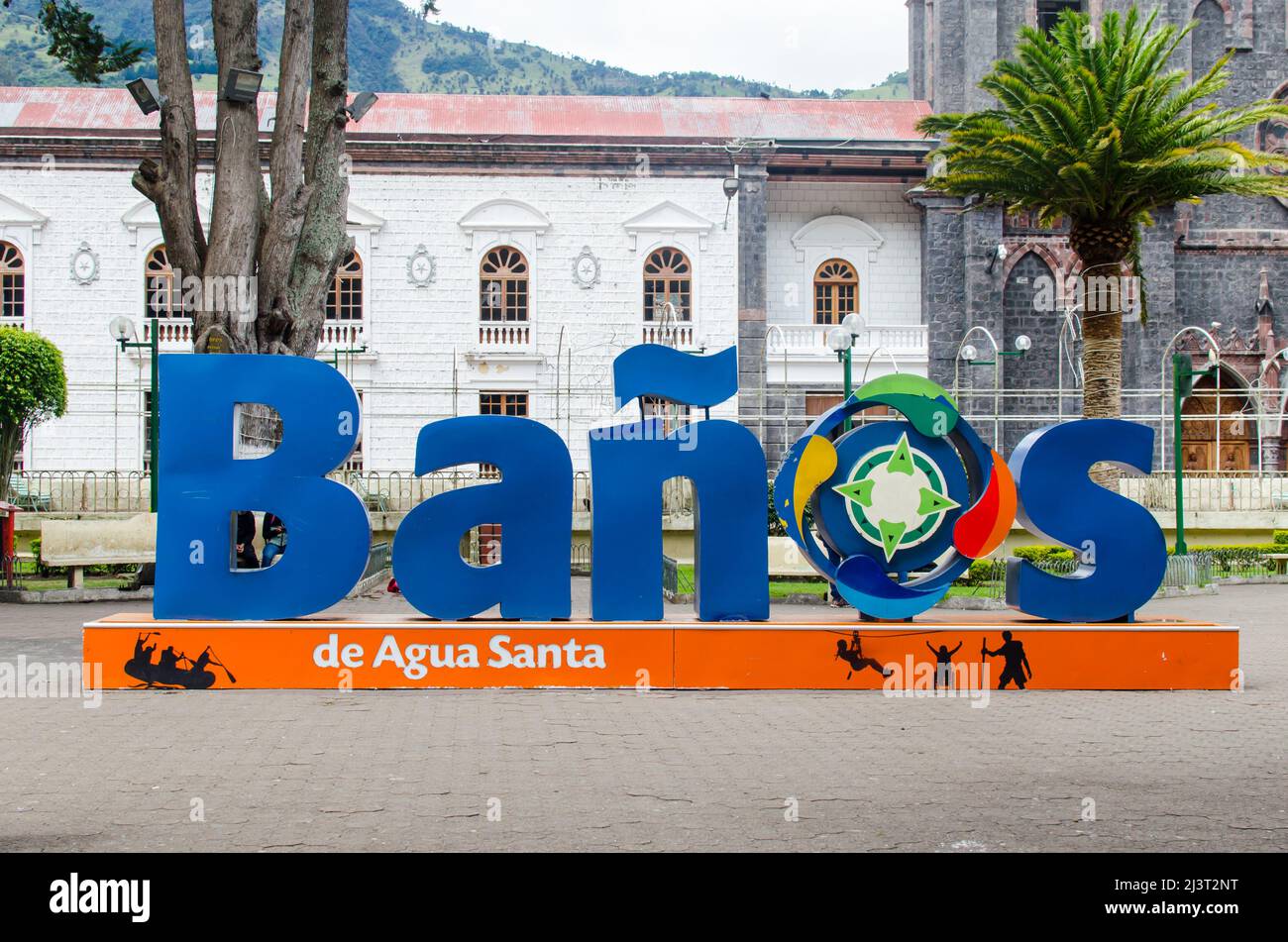 A sign welcomes visitors to the City of Baños in Tungurahua Province, Ecuador Stock Photo