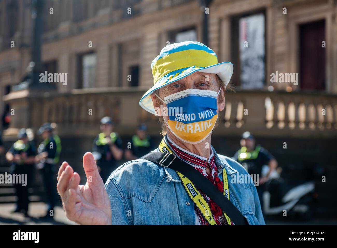 Melbourne, Australia. 10th Apr, 2022. A man with a mask reading 'Stand With Ukraine' at a rally for Ukraine in Melbourne. Credit: Jay Kogler/Alamy Live News Stock Photo