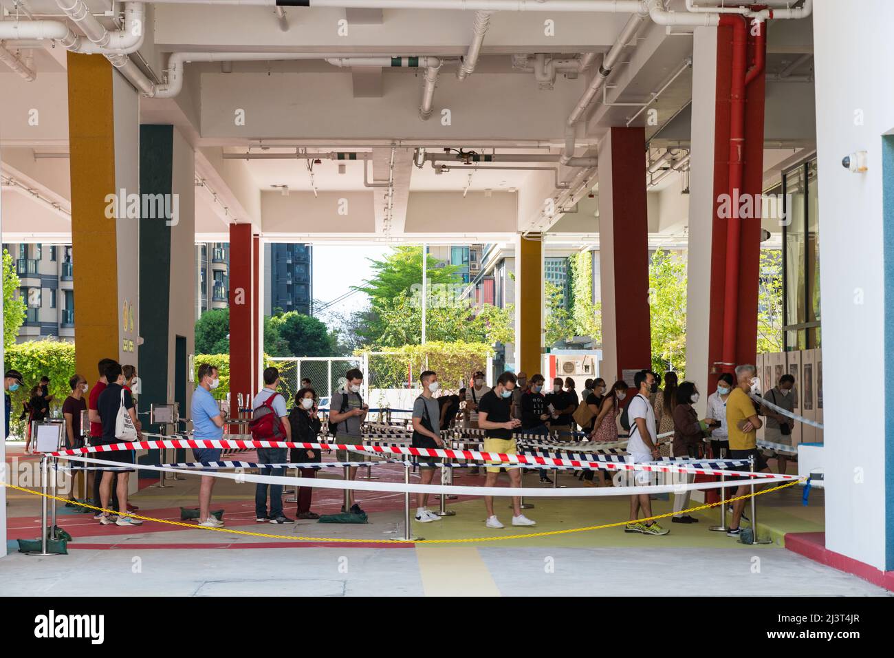 Hong Kong, China. 10th Apr, 2022. French voters stand in line to vote at the French Presidental election in the French International School of Tseung Kwan O. Credit: Marc R. Fernandes/Alamy Live News Stock Photo