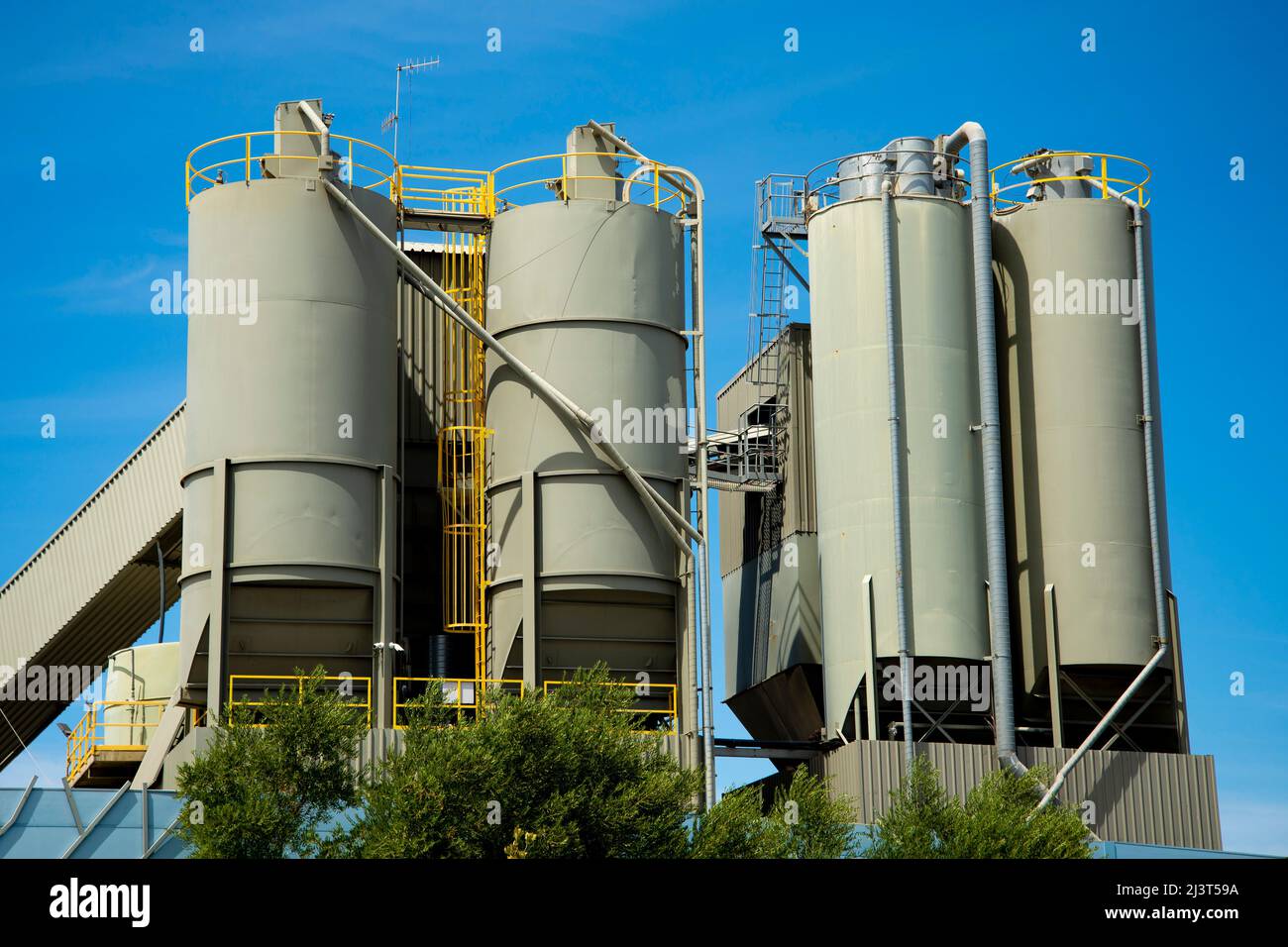 Silos in Industrial Cement Plant Stock Photo