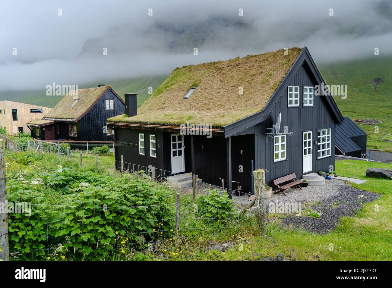 Close up view of the beautiful Black house with grass on the roof in the Faroe Islands Stock Photo