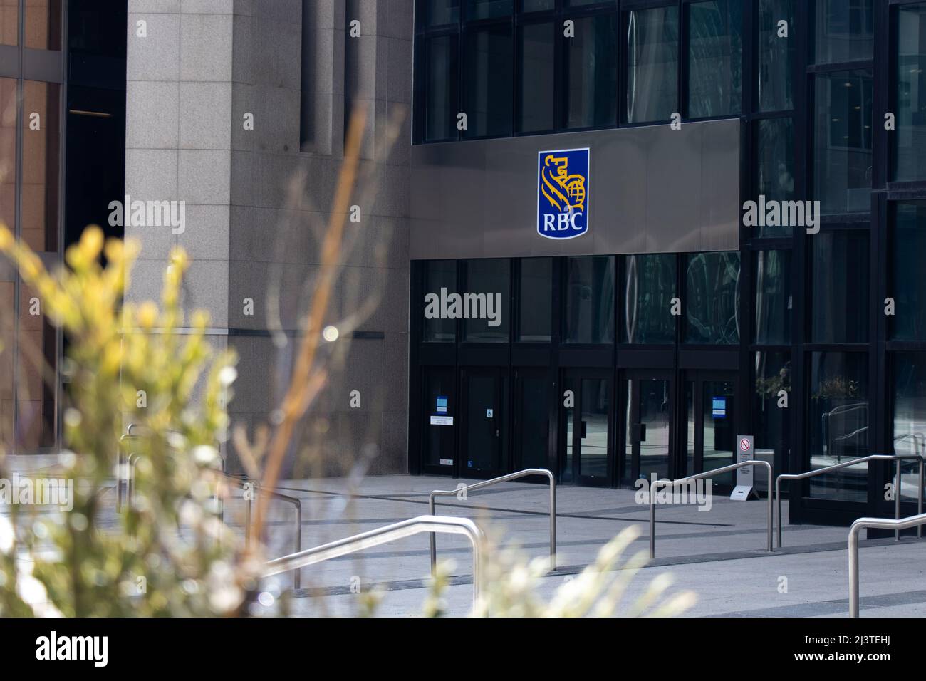 The Royal Bank of Canada (RBC) logo is seen at the base of the Royal Bank Plaza in downtown Toronto. Stock Photo