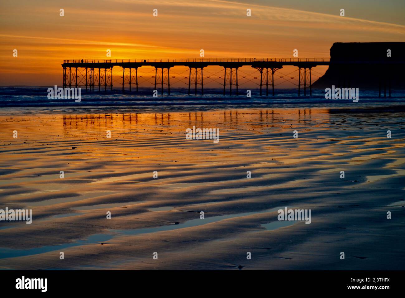 Stunning colourful image of a beautiful sunrise at Salburn Pier, Saltburn-By-The-Sea on the North Yorkshire coast, UK. Stock Photo