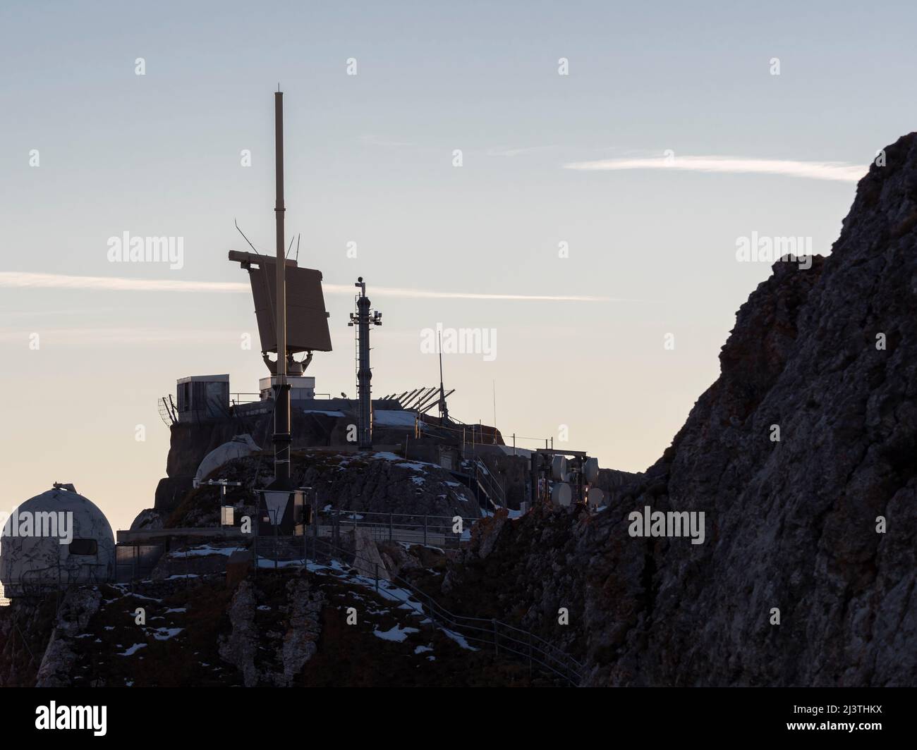 MIlitary radar antenna for aerial reconnaissance on top of mount Pilatus (Pilatus Kulm, alt. 2132m) in the Swiss alps. Stock Photo
