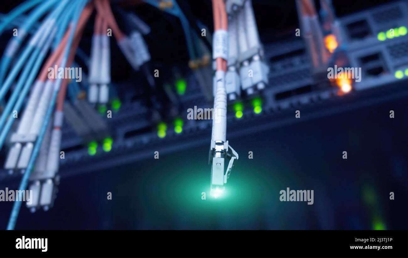 Fiber optic and hub in data center. Close up Stock Photo - Alamy