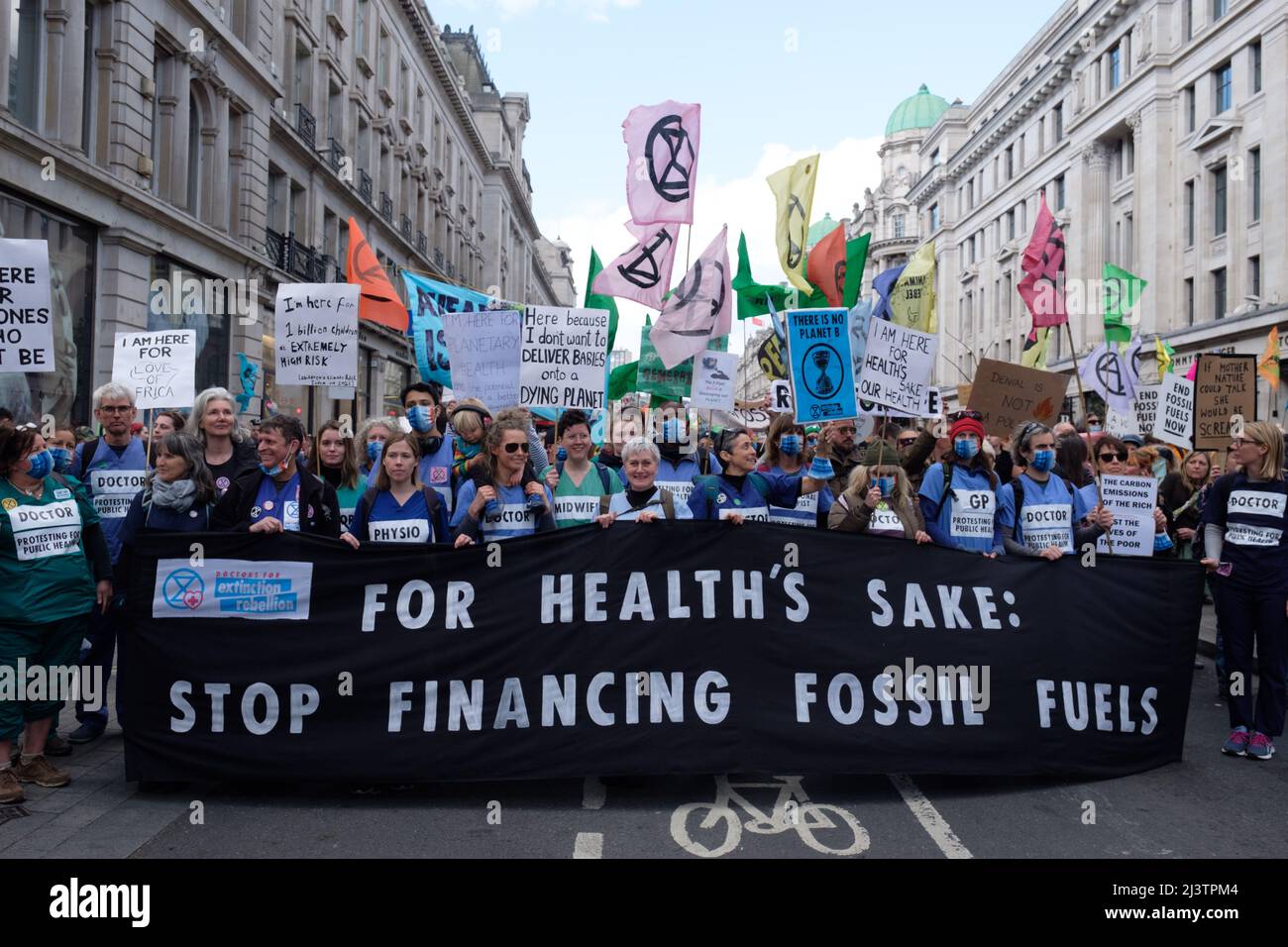 London, UK. 9th Apr, 2022. Extinction Rebellion (XR) activists gathered in Hyde Park and marched through Oxford Street making a stop in Oxford Circus, St James Square where BP is headquartered and finally to Trafalgar Square where traffic was blocked. Today was part of a week long wave of protests and civil disobedience actions to demand an immediate stop to all new fossil fuel infrastructure by the British government amid the climate crisis and ecological emergency. Stock Photo