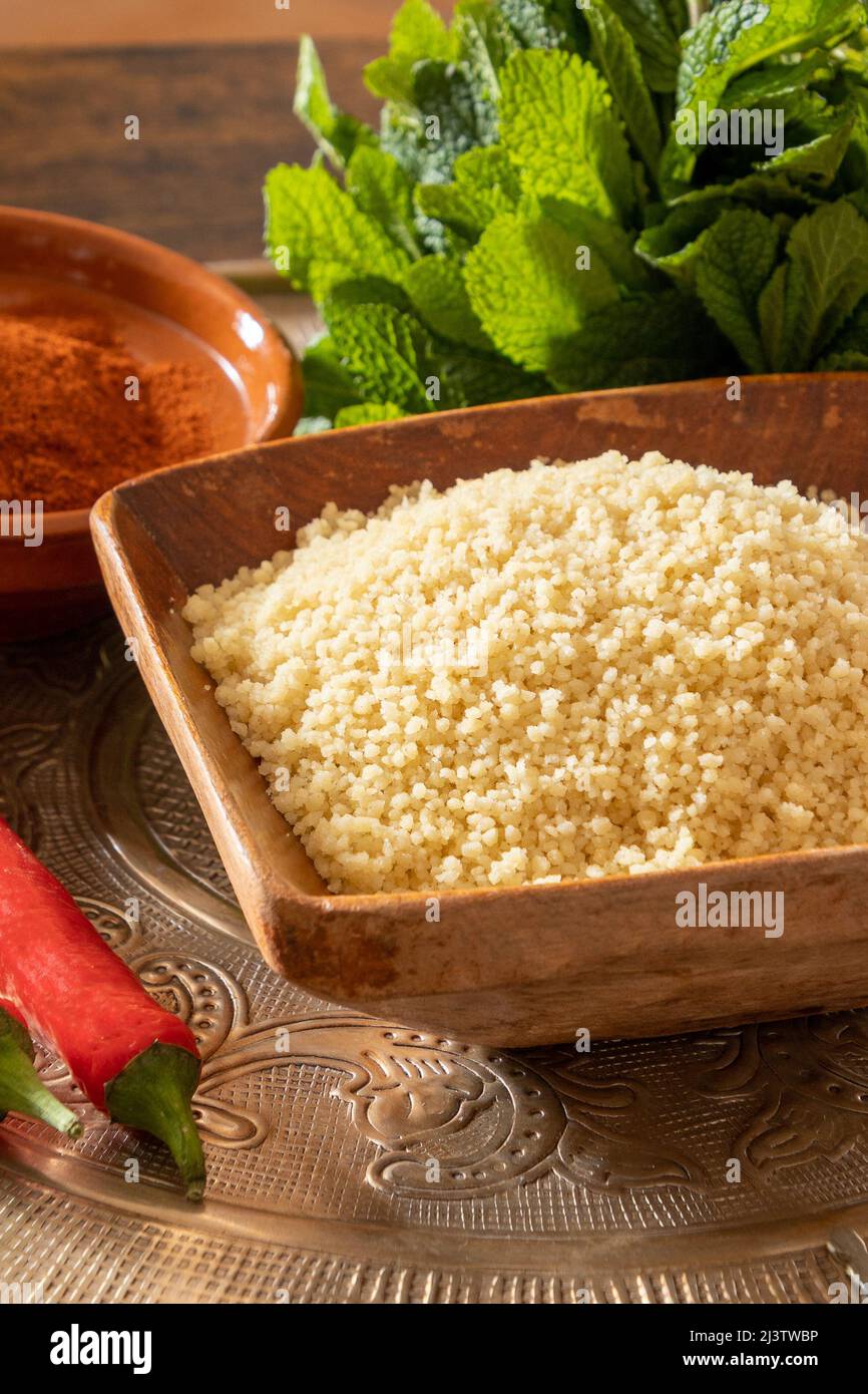 cooked semolina in a bowl on a tray with spices Stock Photo - Alamy