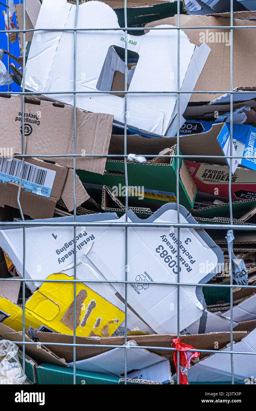 10 April 2022. Recyclable cardboard boxes in roll cages or wire