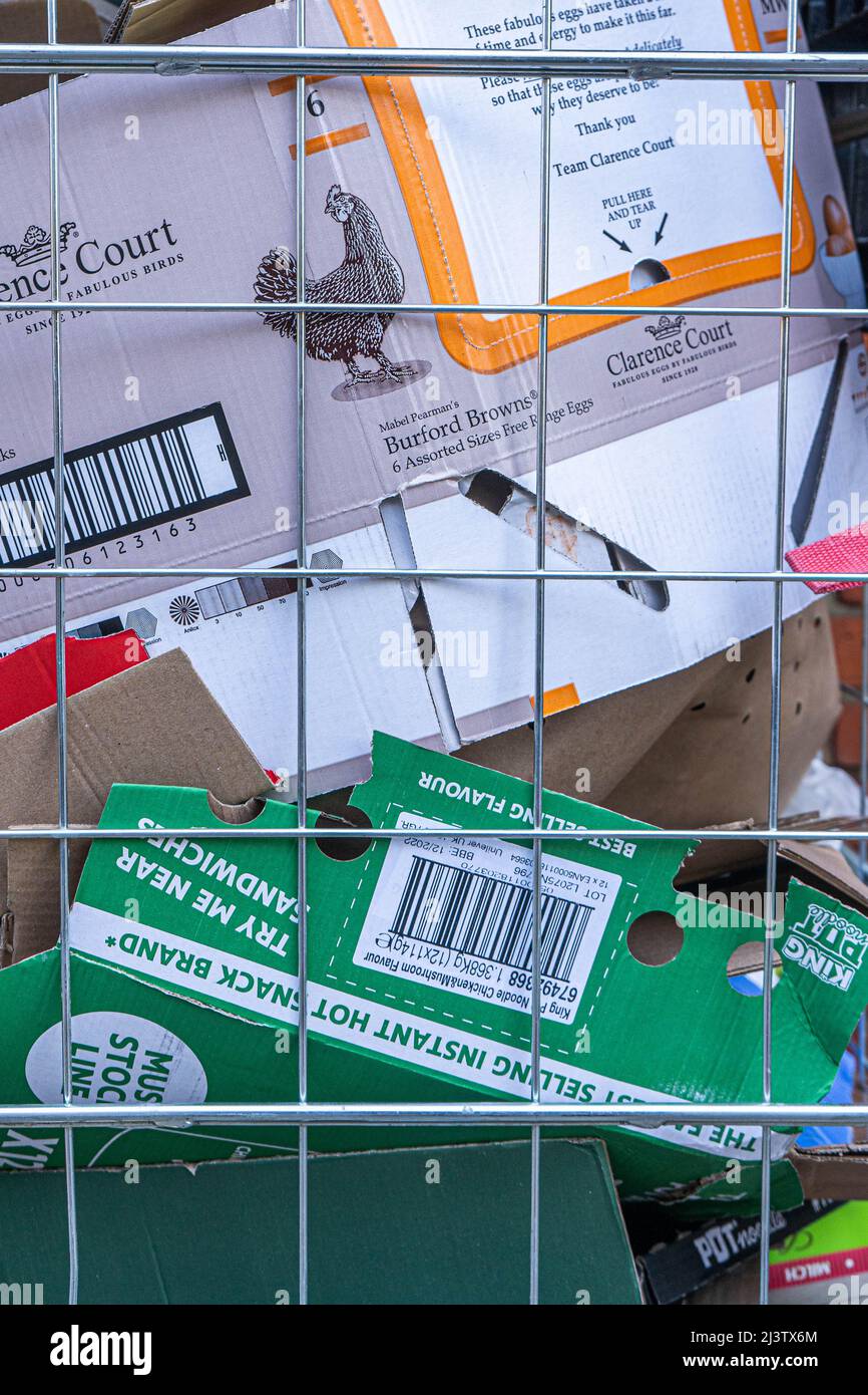 10 April 2022. Recyclable cardboard boxes in roll cages or wire