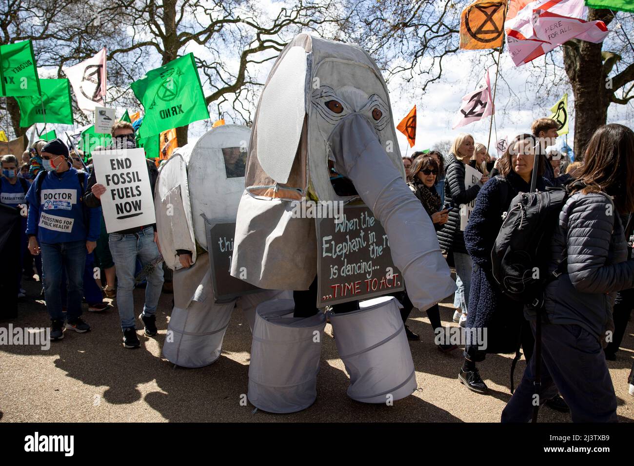 Protesters dressed in an elephant costume to mock the delay of action of the government in tackling climate emergency seen during the demonstration. Climate change protest group Extinction Rebellion calls on a new round of a series of protests over Easter holidays to push for ending the use of fossil fuels. The protesters demands an immediate end to all new fossil fuel investments as the reliance on fossil fuels is funding Russia-Ukraine War, contributing to the cost of living crisis, and leading to the climate breakdown. (Photo by Hesther Ng/SOPA Images/Sipa USA) Stock Photo