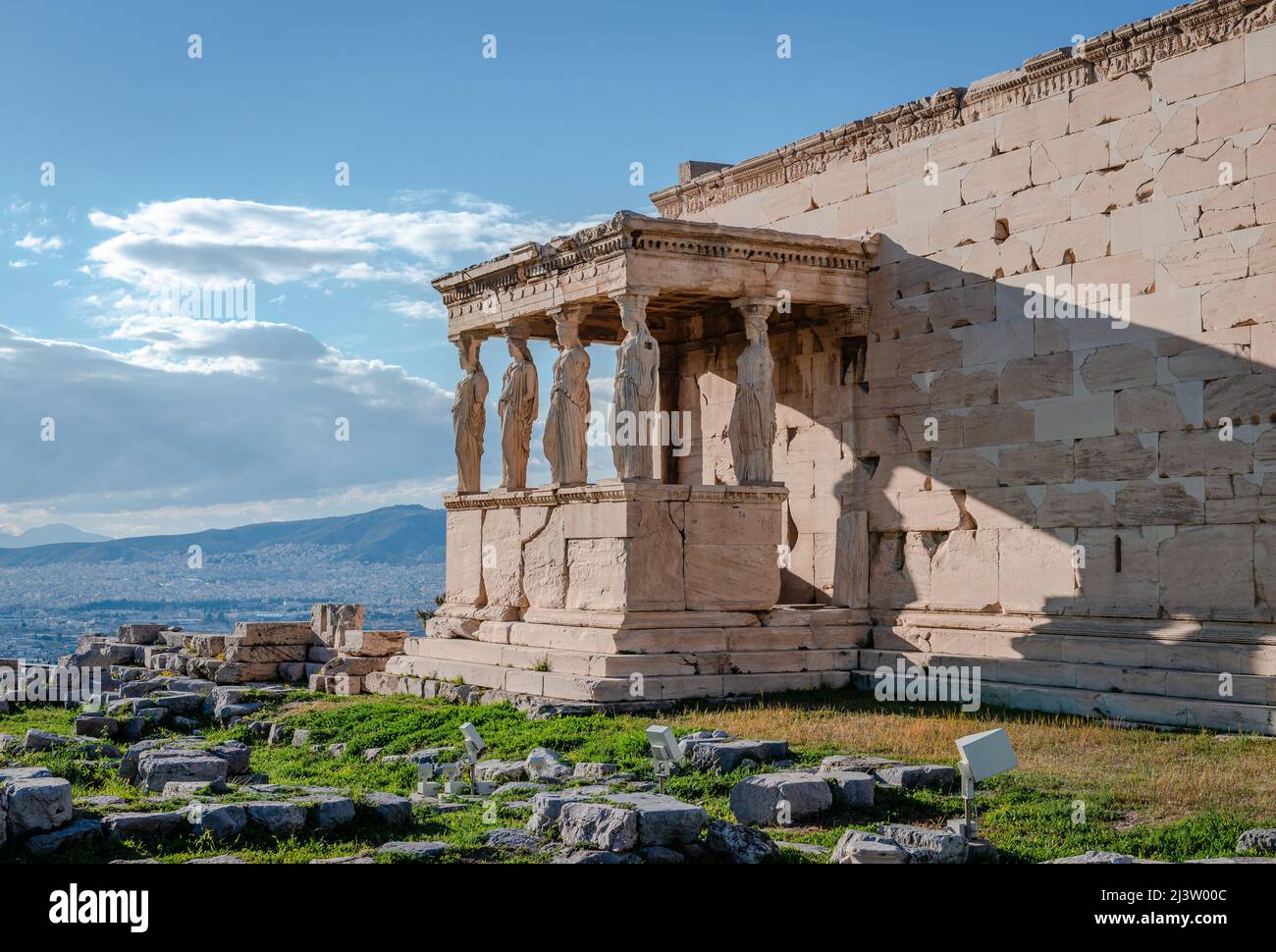 The Caryatid porch of the Erechtheion, an ancient temple dedicated to Goddess Athens on the Acropolis Hill, in Athens, Greece. Stock Photo