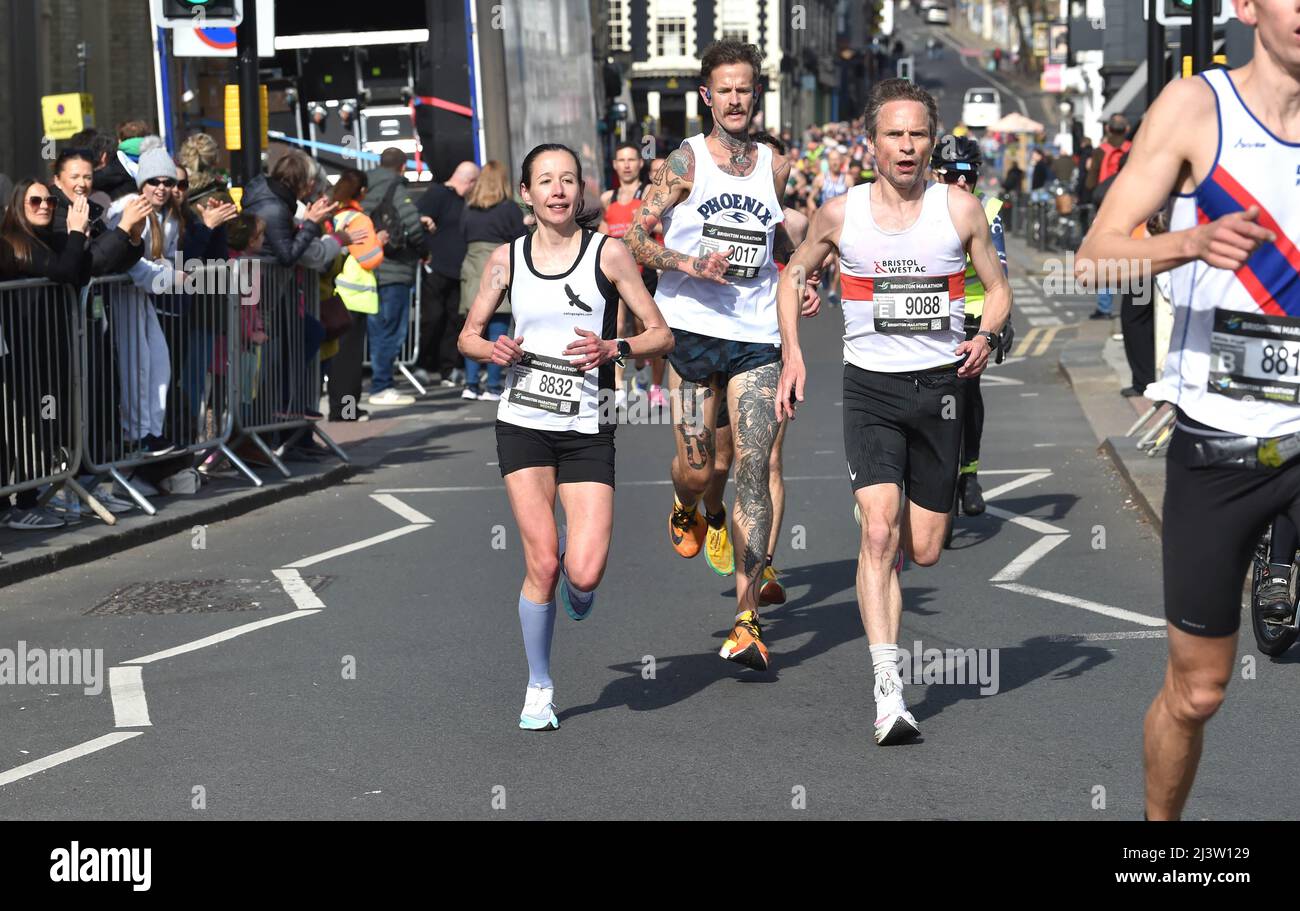 Brighton UK 10th April 2022 - Some of the early pace setters as thousands of runners taking part in the Brighton Marathon today with many raising money for charities : Credit Simon Dack / Alamy Live News Stock Photo