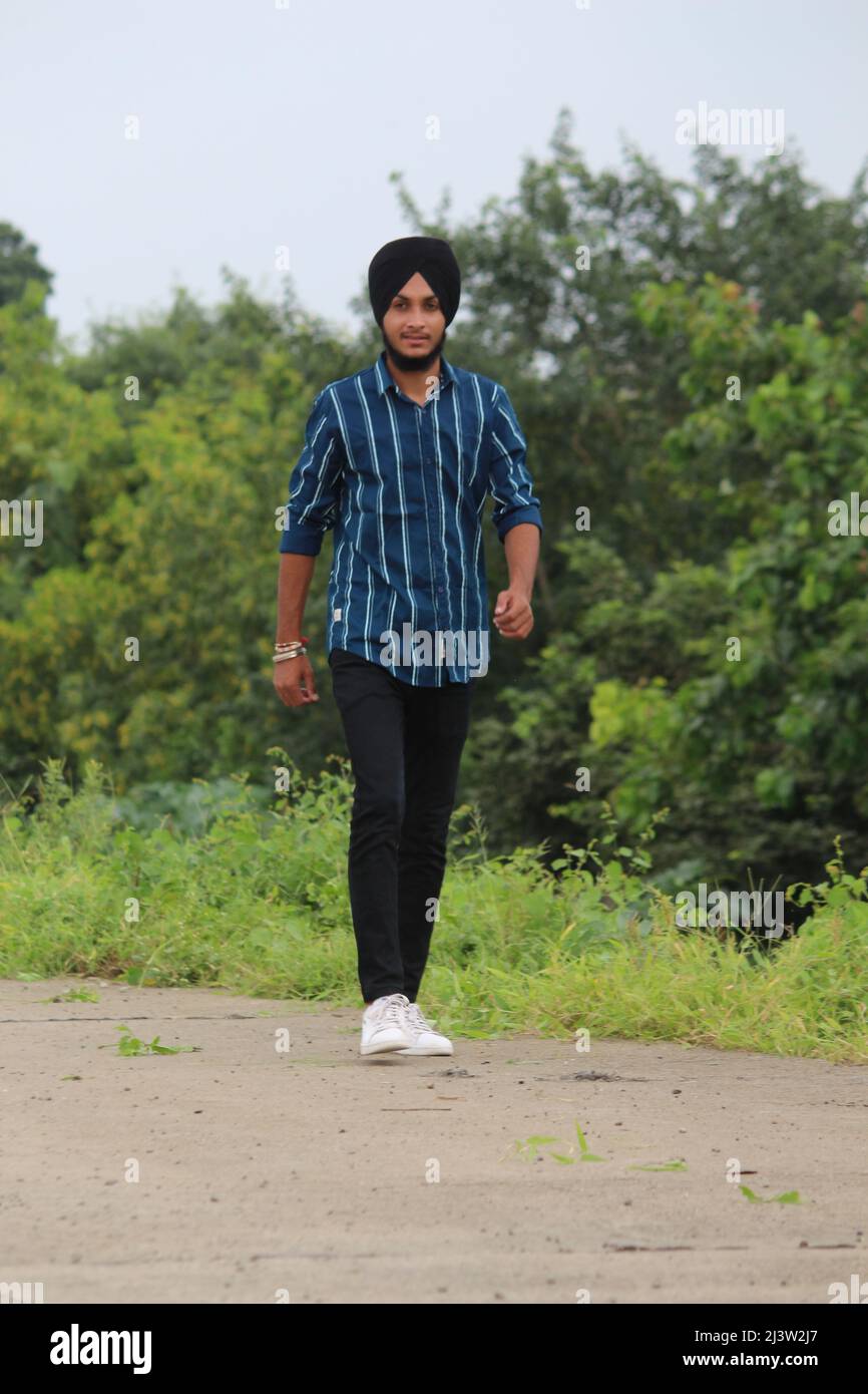 Portrait Of Young Happy Indian Sikh Handsome Man With Smile Mumbai Portrait Of Young Happy Indian Sikh Handsome Man With Smile Mumbai