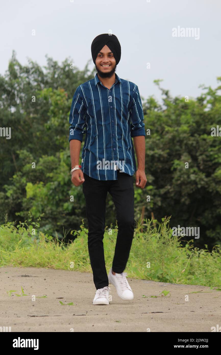 Portrait Of Young Happy Indian Sikh Handsome Man With Smile Mumbai Portrait Of Young Happy Indian Sikh Handsome Man With Smile Mumbai